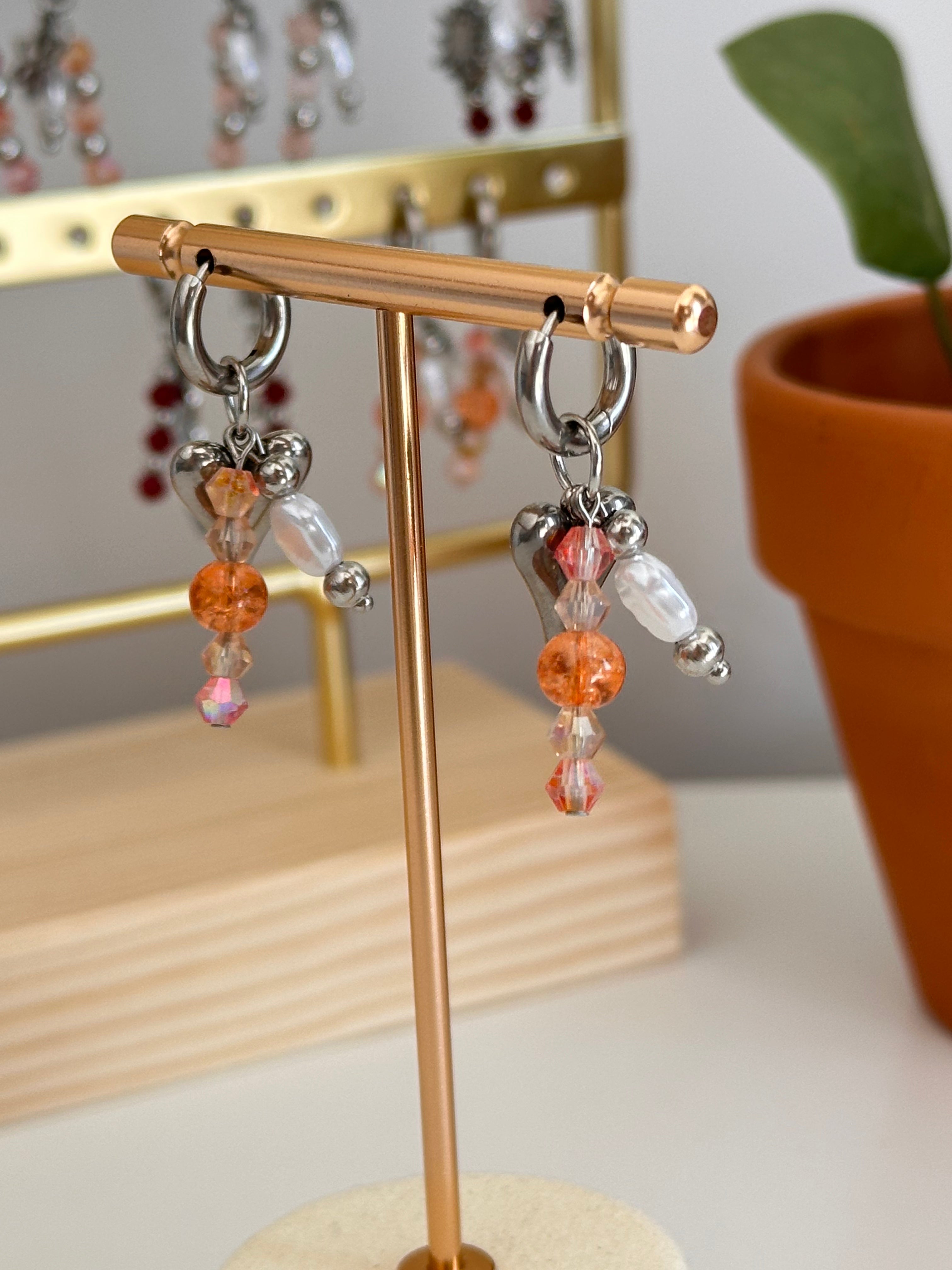 Coral heart oorbellen
