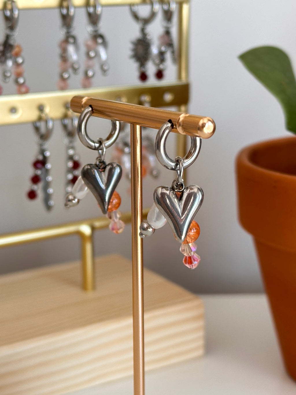 Coral heart oorbellen