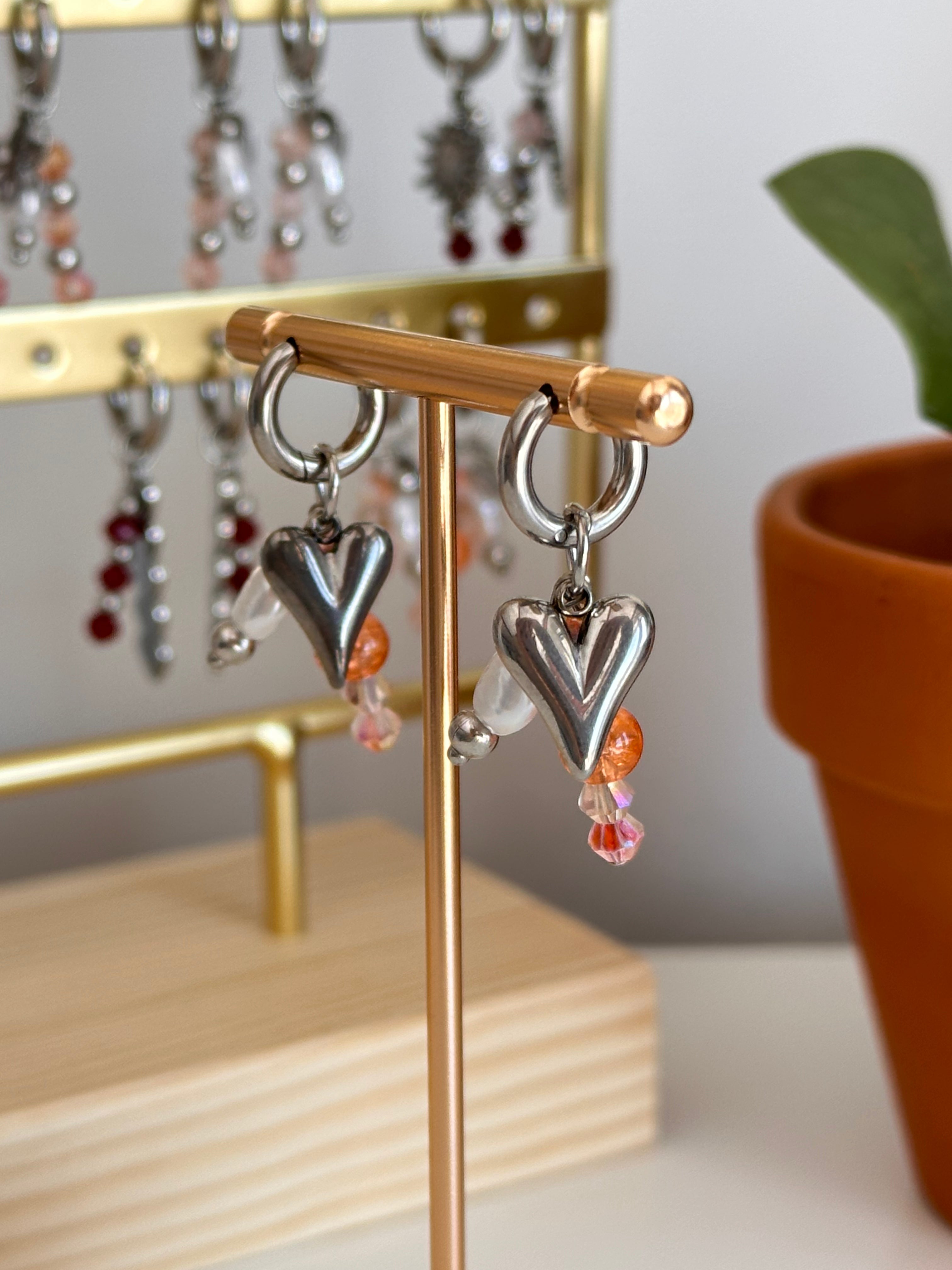 Coral heart oorbellen
